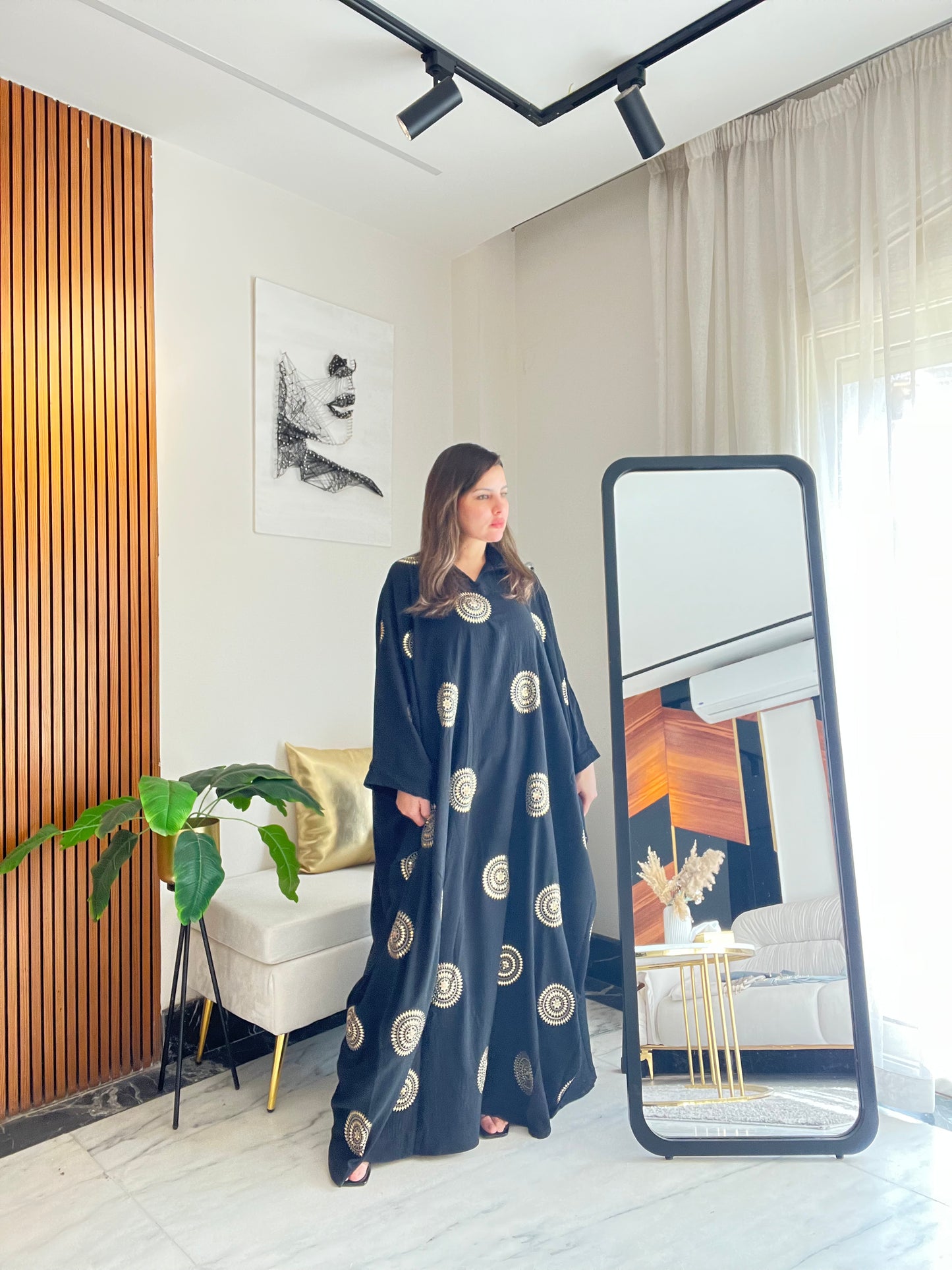 Abaya with elegant gold details for Ramadan evenings