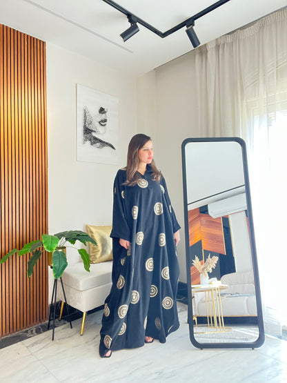 Abaya with elegant gold details for Ramadan evenings