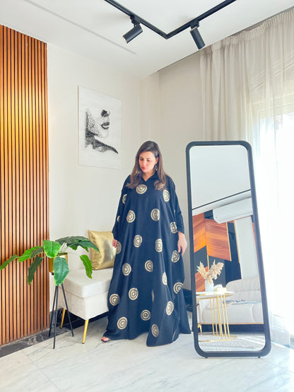 Abaya with elegant gold details for Ramadan evenings