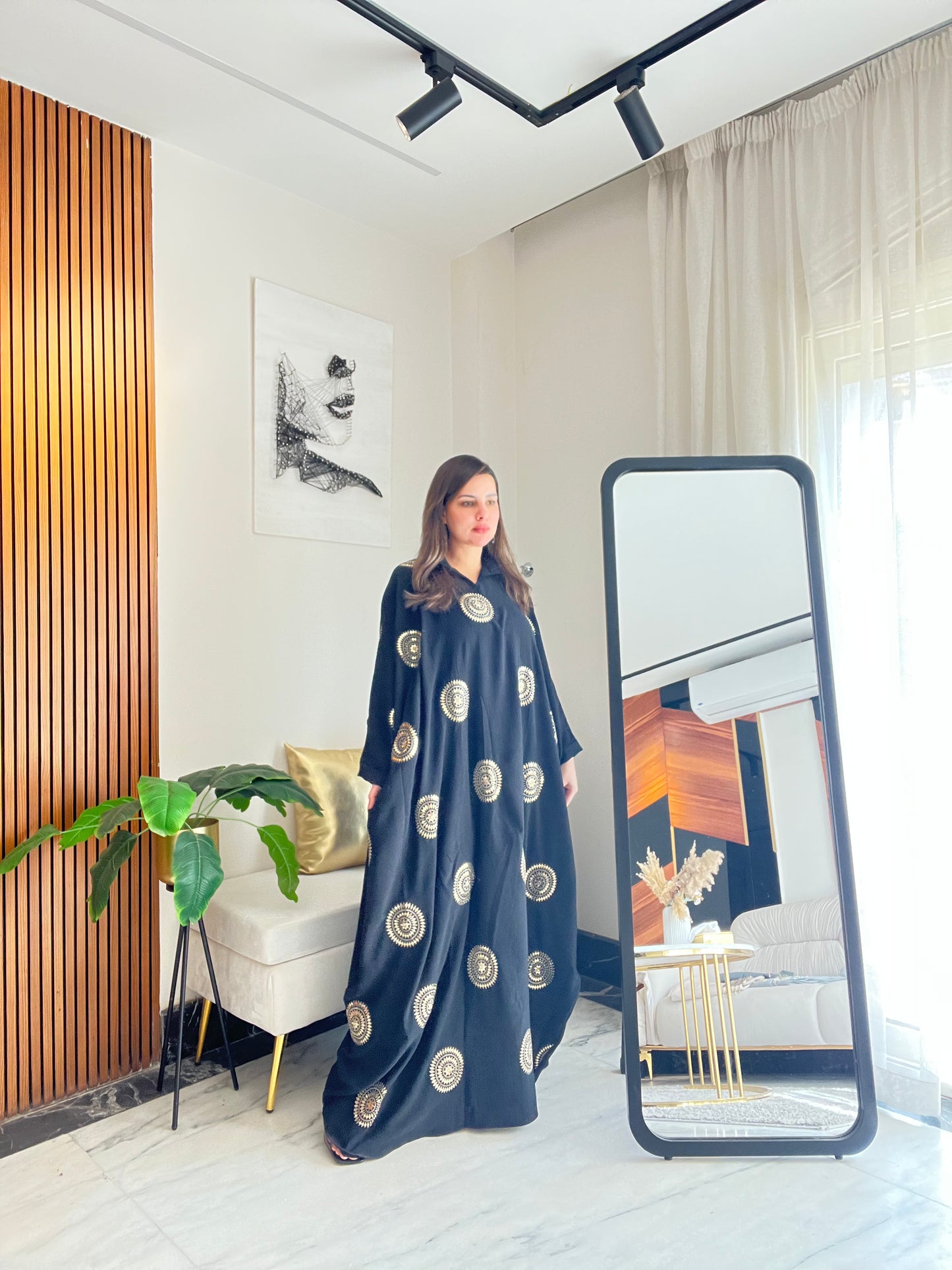 Abaya with elegant gold details for Ramadan evenings