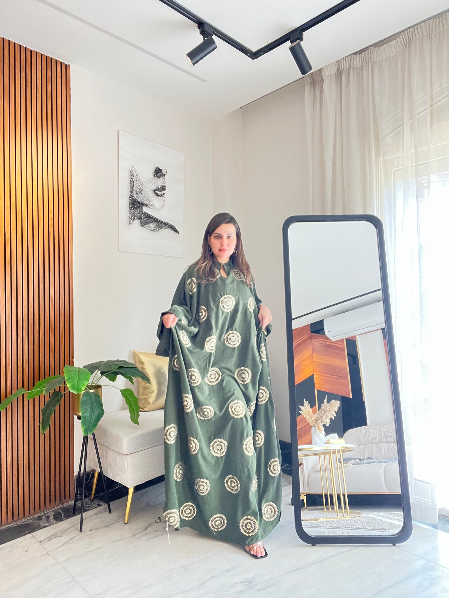 Abaya with elegant gold details for Ramadan evenings